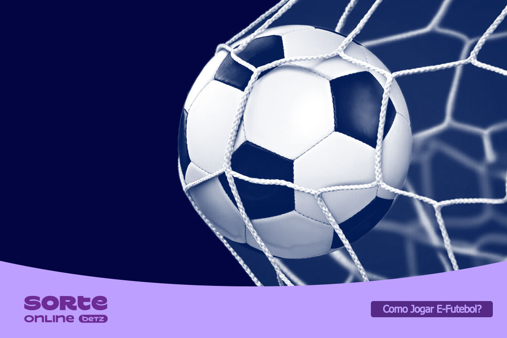 Bola de futebol na rede do gol sobre fundo azul-escuro. Sorte Online Betz explica o que é o e-futebol e como apostar.